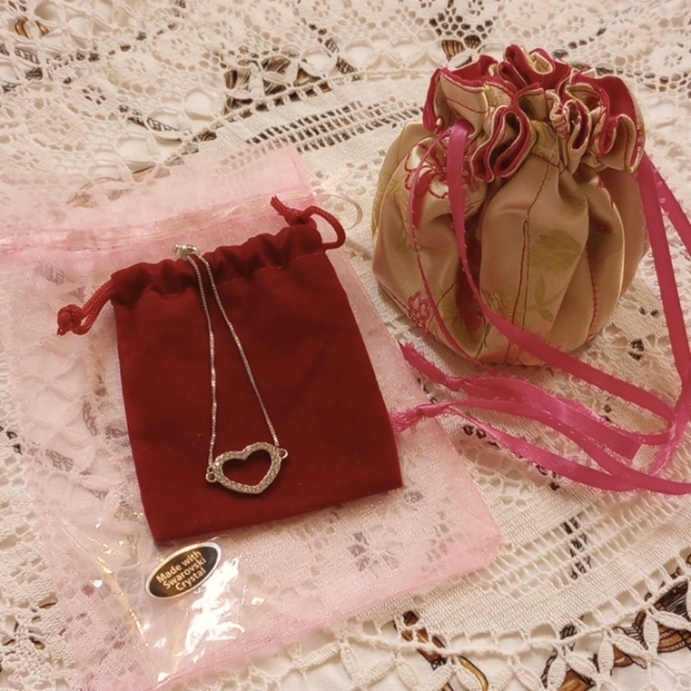 - Swarovski Crystal Heart Bolo Bracelet